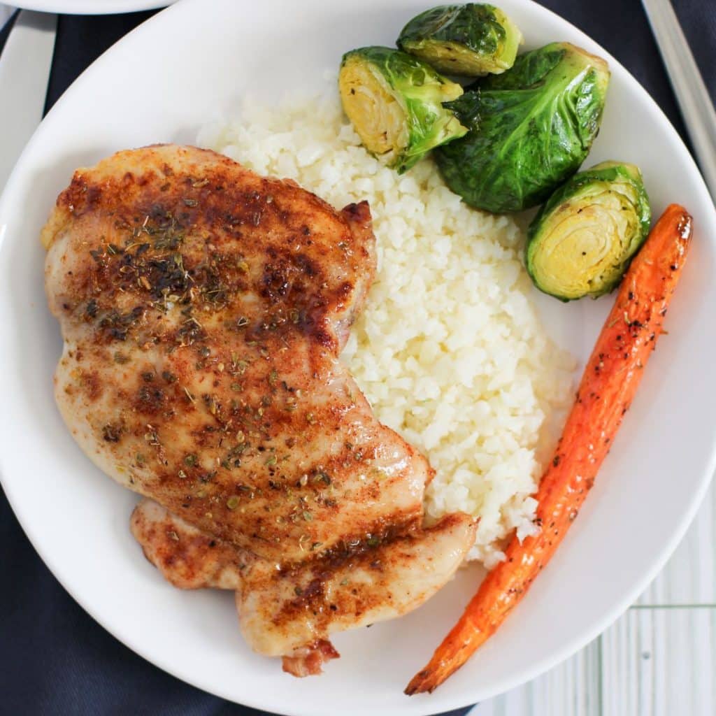 Chicken thighs on plate