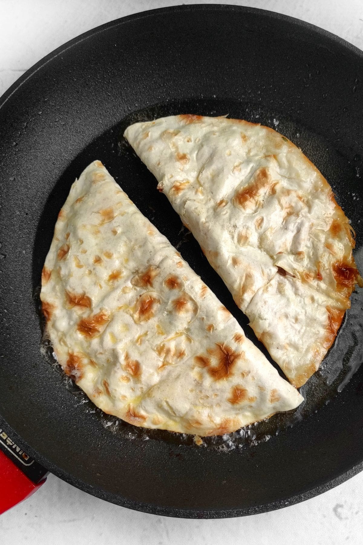 Ground Beef mixture on no carb tortilla fried