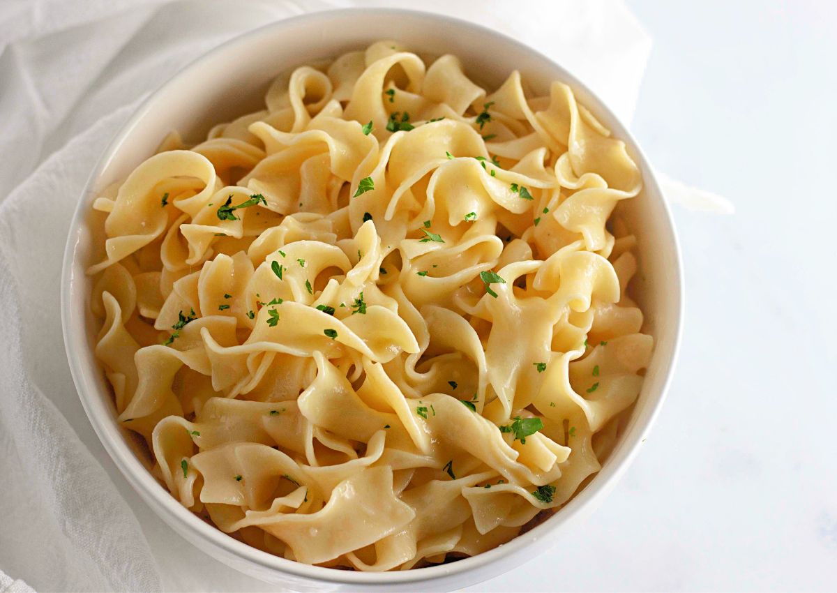 Lemon buttered noodles in a bowl.